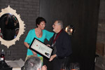 Kathy Kallaus presenting Mike Mass his Silver Medallion and Certificate.