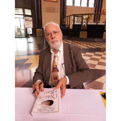 James D. Porterfield signs copies of his book at the Durham Museum, Omaha NE
